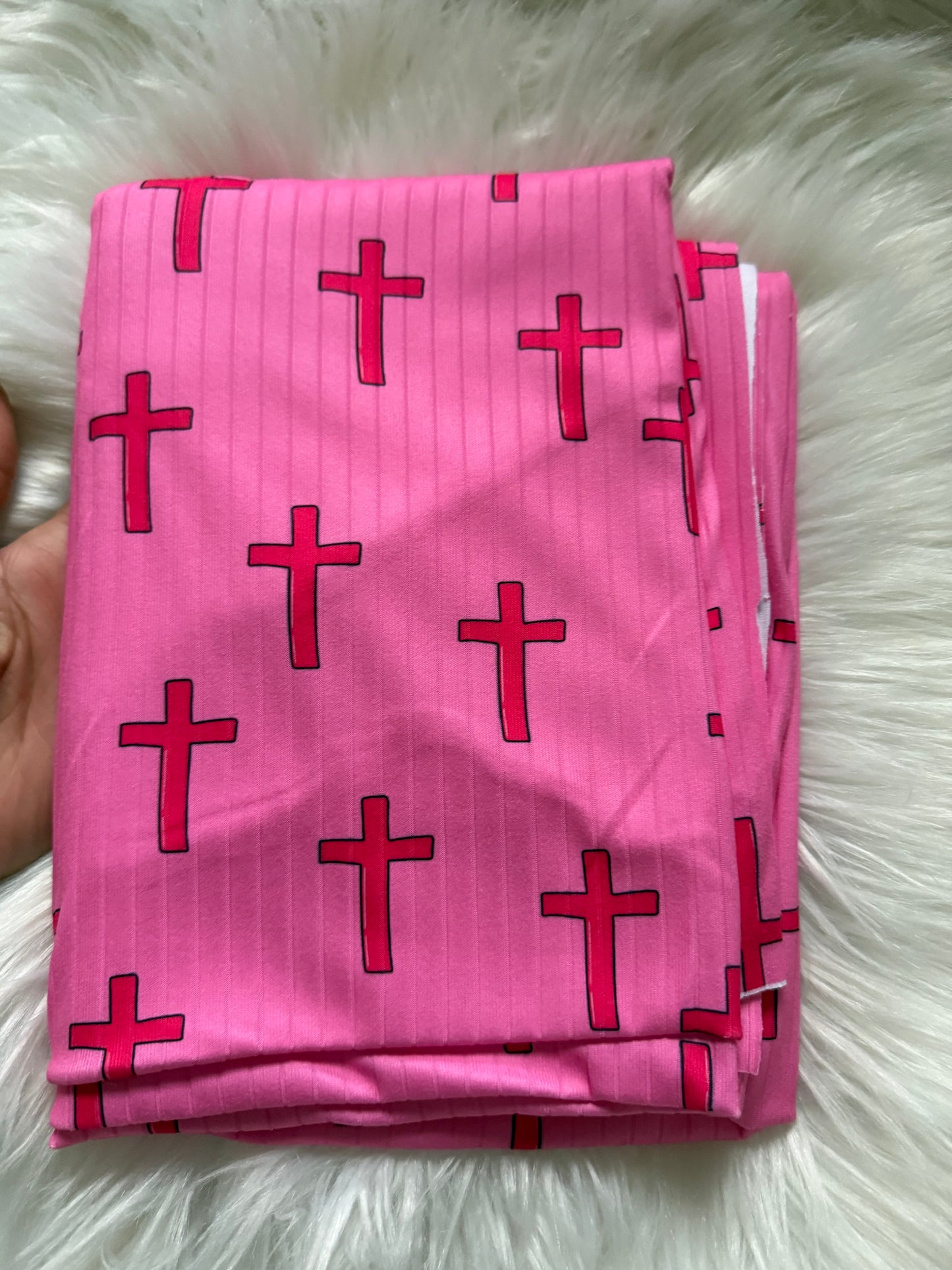 Pink crosses on pink brushed ribknit