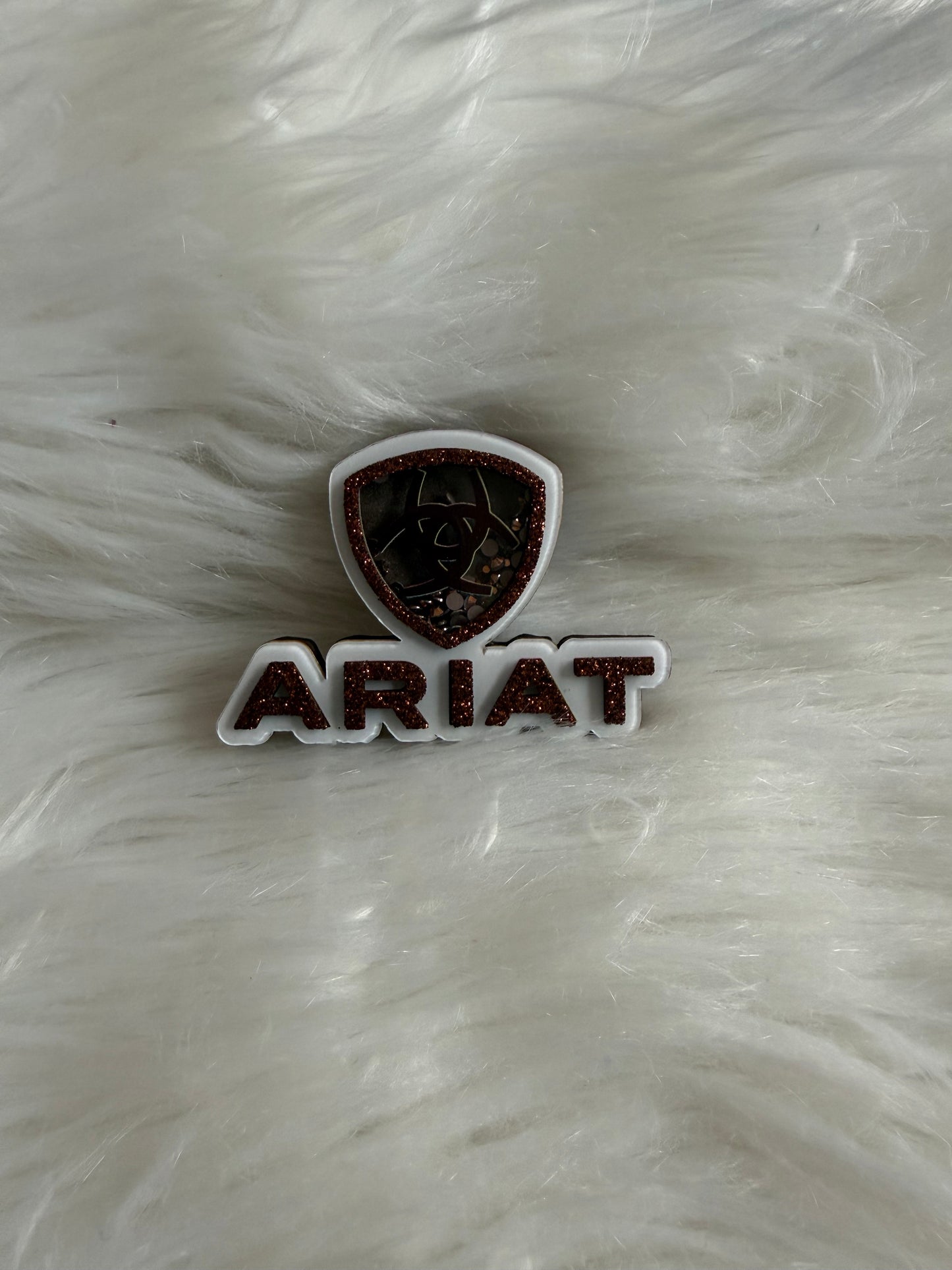 Brown cut Ariat shaker