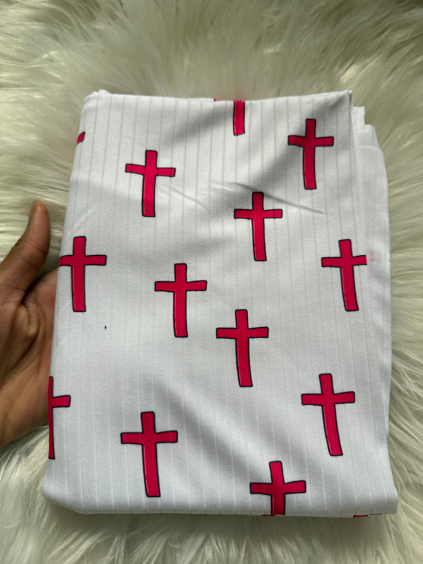 Pink crosses in white brushed ribknit