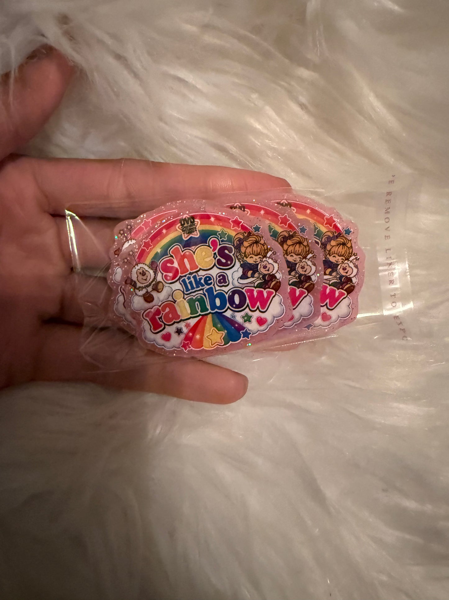 She’s like a rainbow acrylic flat back