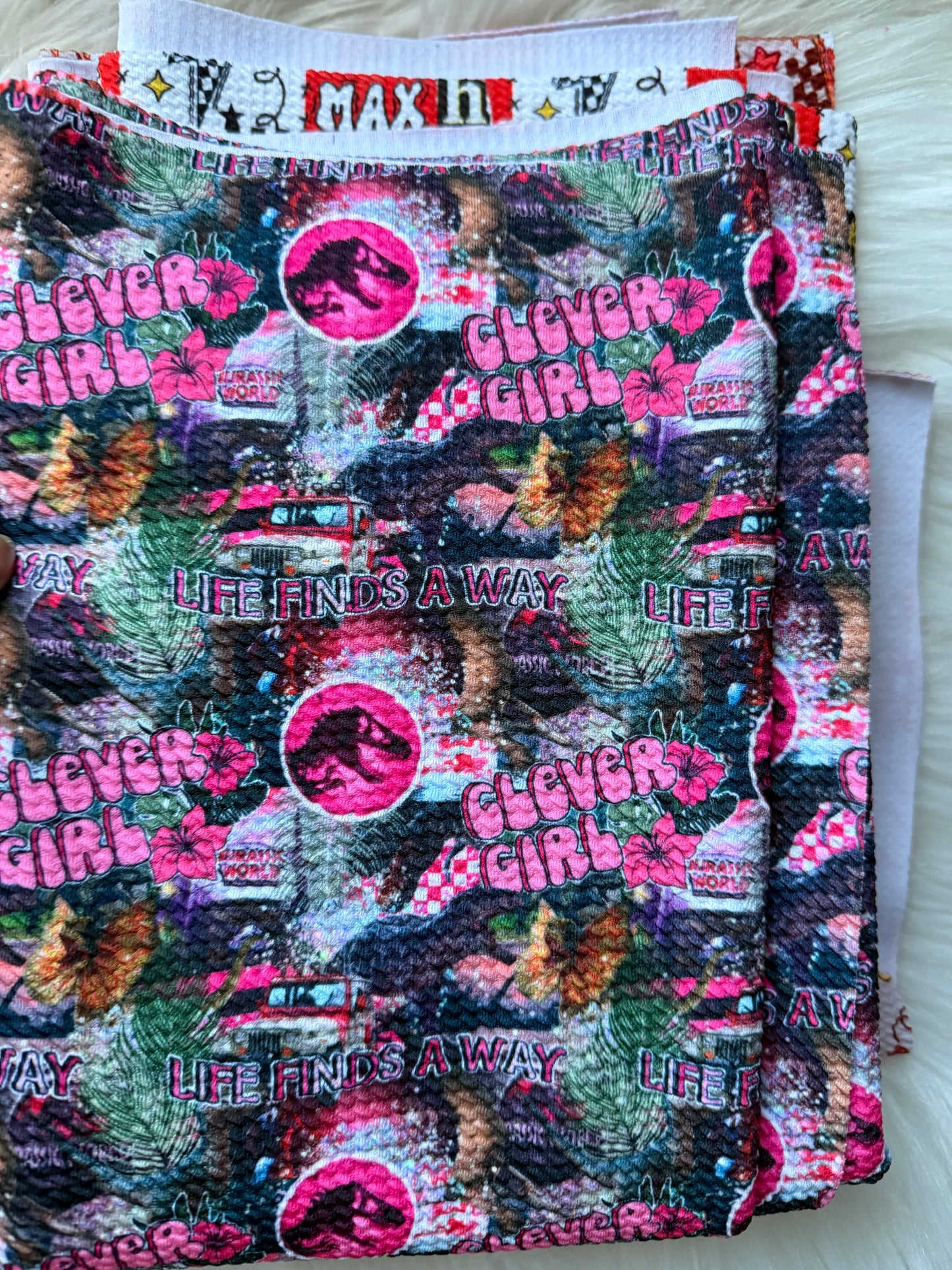 Clever girl Jurassic park collage bullet half yard