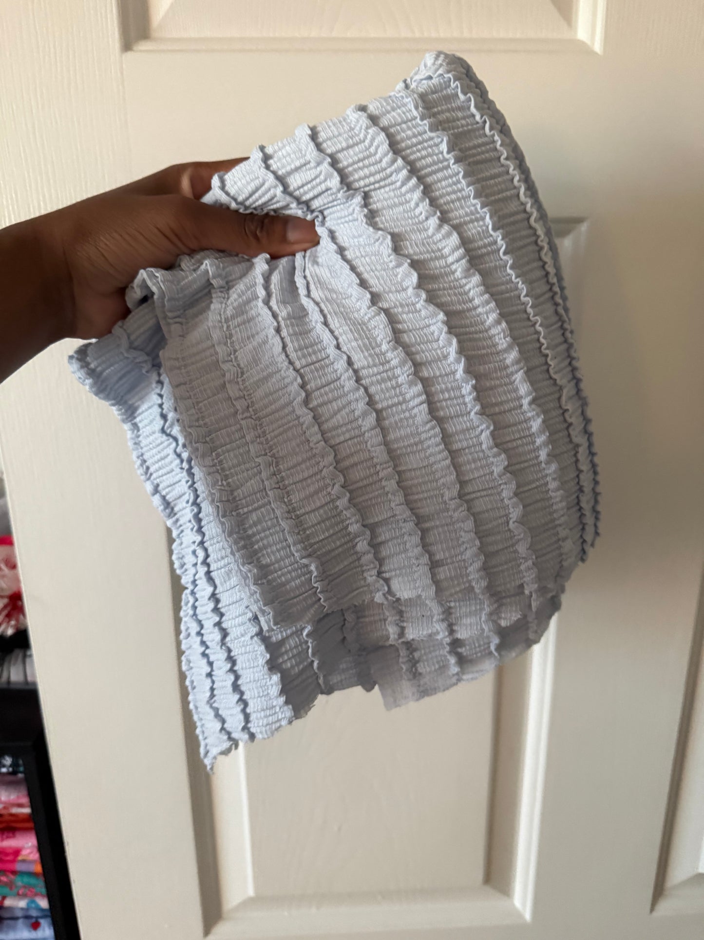 Lite blue ruffle knit fabric
